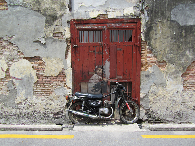 The Boy on a Bike mural by Ernest Zacharevic. Photo: Chris Ashton