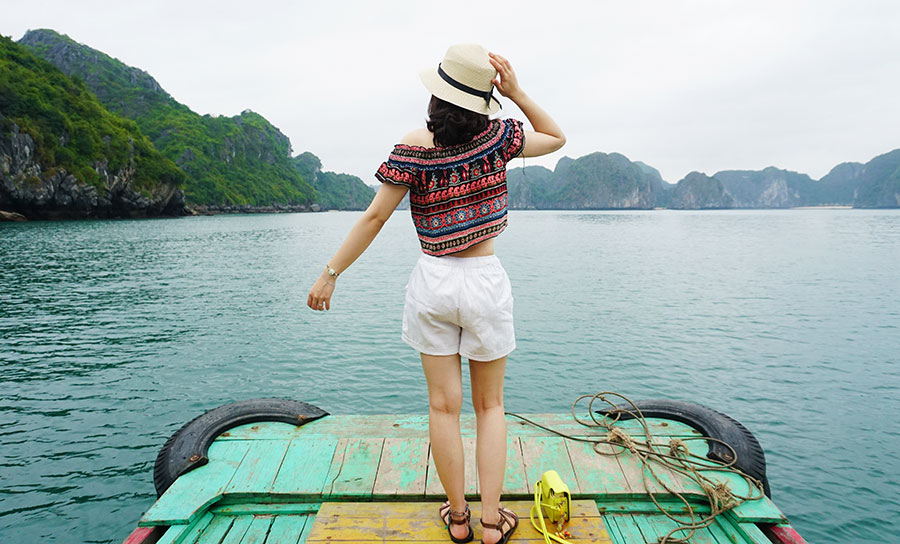 A woman stands looking across Lan Ha Bay. Photo: Supplied