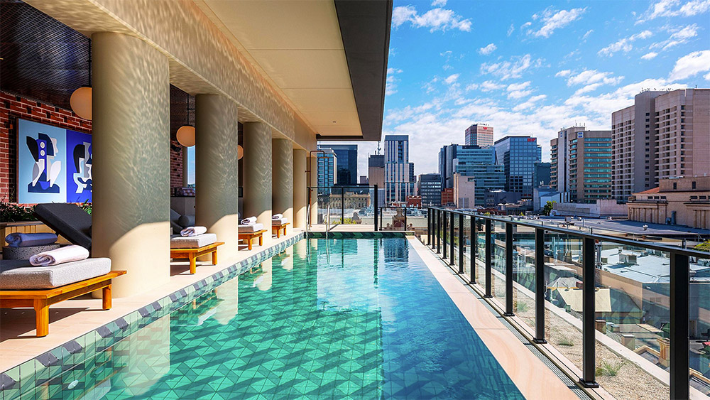 A pool with a view at Hotel Indigo Adelaide Markets