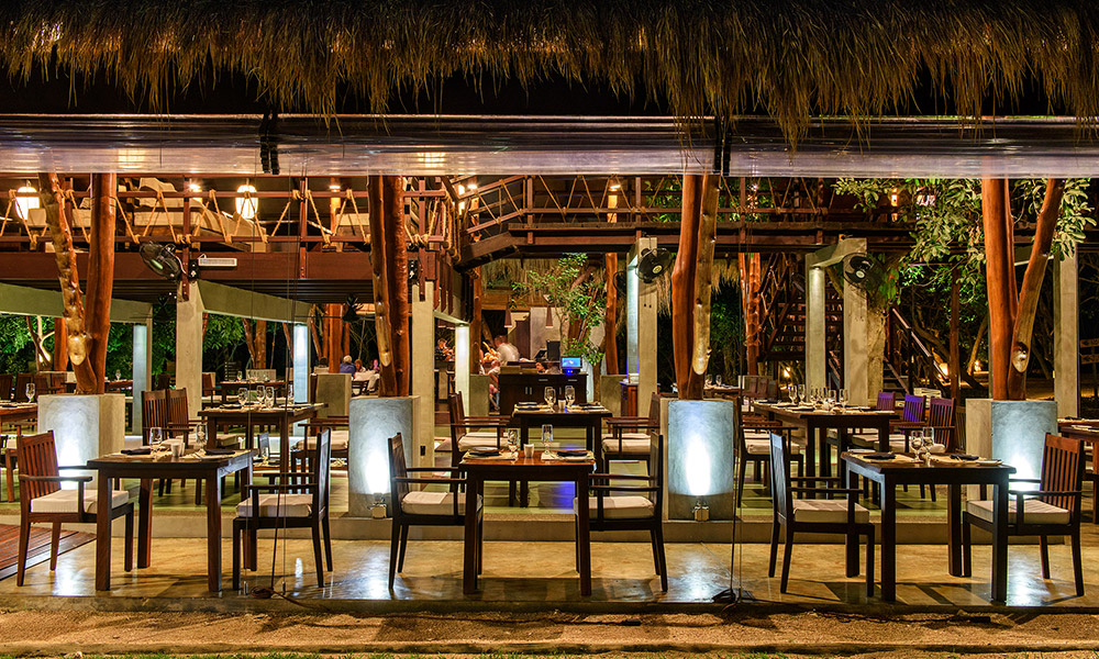 The open-air dining room at Jungle Beach. Credit: Uga Escapes