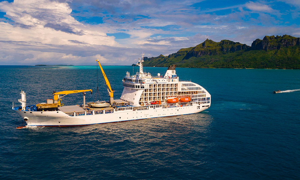 Aranui 5 - part freighter, part cruise ship - at Raivavae. Credit: Lionel Gouverneur/Supplied.