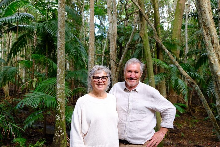 Pam and Martin Brook in the rainforest they've regenerated over the last 30 years. Photo: Simon Ceglinski