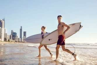 Surf in paradise with the Queensland Holidayer Pass. Credit: Tourism and Events Queensland